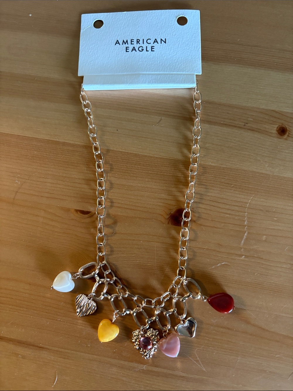 American Eagle Outfitters Gold Tone Charm Necklace with Multicolor Heart Charms